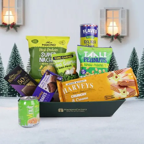 Looking for the ultimate holiday treat? This Gourmet Christmas Treat Gift Set is packed with an amazing variety of snacks that will bring joy to any celebration  With everything from protein rich nachos and crunchy peas to decadent chocolates and creamy wafers, theres something for everyone to enjoy  Plus, the reusable basket makes for a great gift that keeps on giving!