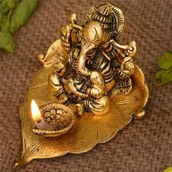 Exclusive Ganesha on Leaf with Diya