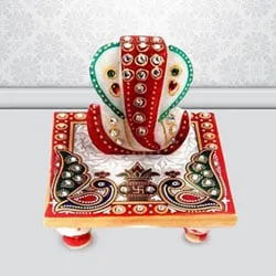 Propitious Marble Ganesh Chowki with Peacock Design