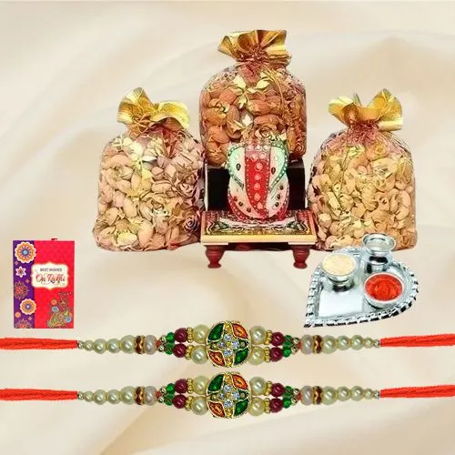 Appealing Stone Rakhis with Dry Fruits Marble Ganesha n Paan Shaped Thali