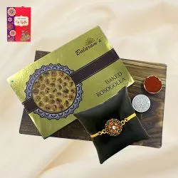 Enjoyable Balaram Mullicks Baked Rasgulla with Golden Plated Rakhi