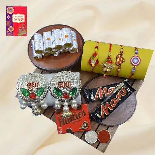 Lavish Gift of Family Rakhi Set with Haldiram Sweets Chocolates N Puja Decoration