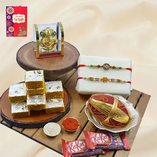 Fantastic Swastik Rakhi Pair with Puja Item Haldiram Sweets N Chocolates