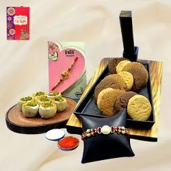 Traditional Haldiram Kaju Pista Basket with Cookie Mans Cookies  N  Twin Rakhi