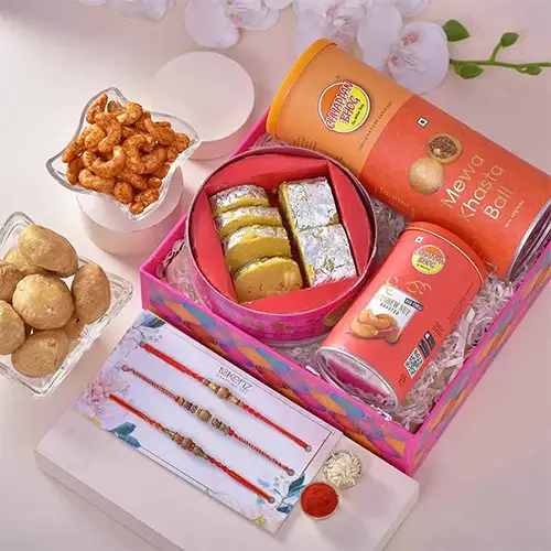 Lovely Tripple Rakhi n Treats Hamper