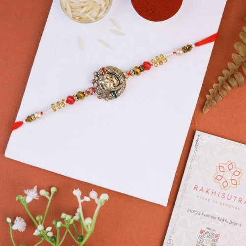 Spiritual Ganesh Rakhi Gift Collection