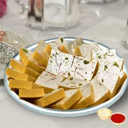 Toothsome Kaju Kesar Katli from Haldiram  with free Roli Tilak and Chawal.