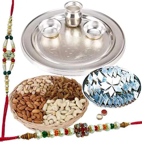 An amazing Silver plated Thali Haldiram Kaju Katli Dry Fruits with free Rakhi Roli Tilak and Chawal