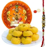 Free Rakhi with Delicious Kesar Pedas and Designer Pooja Thali